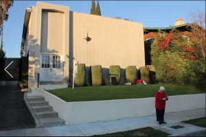 UPSIDE DOWN CROSS PLACED OUTSIDE OBAMA’S OLD APARTMENT IN HIS HONOR…