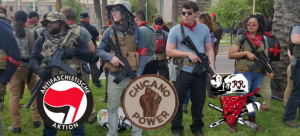 Far-left activists hold armed march in Phoenix…