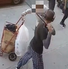 Shocking moment thug hits a 90-year-old man over the head with a CANE in unprovoked Manhattan attack…