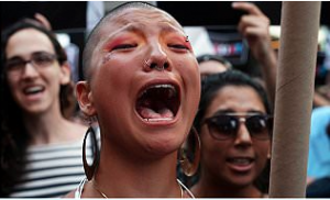 WILTING DANDELIONS RISE: Furious protests erupt in NY and DC after Trump bans transgender people from the military…