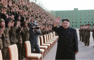 Theater of War: Kim Jong-Un “The Rocket Man” pictured with gigantic missile…