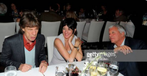 Alleged Jeffrey Epstein child sex procurer, Ghislaine Maxwell, pictured with Mick Jagger in 2011.