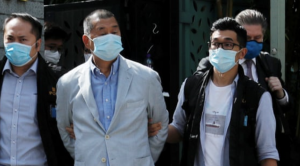 Hong Kong media tycoon Jimmy Lai arrested under new national security law.